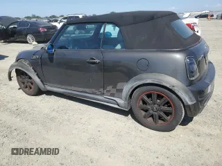 2011 MINI Convertible S с VIN WMWZP3C59BT249133, выставлен на аукционе Copart как лот 56402615 с пробегом 103 809 миль миль и Списание • Salvage title. История ставок и продаж доступна на DreamBid. Изображение 2.