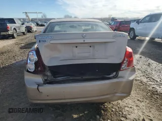 2008 Suzuki Forenza z VIN KL5JD56Z08K908143, wystawiony jako Copart lot #42985685 z przebiegiem 57 435 mil mil oraz Szkoda całkowita • Salvage title. Historia ofert i sprzedaży dostępna na DreamBid. Obrazek 6.