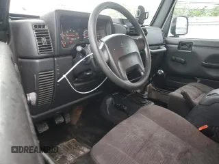 2004 Jeep Wrangler X with VIN 1J4FA39S24P714961, listed as a Copart auction lot 57871235 with 123,164 mi miles and Clean title. Bid and sale history available at DreamBid. Image 8.