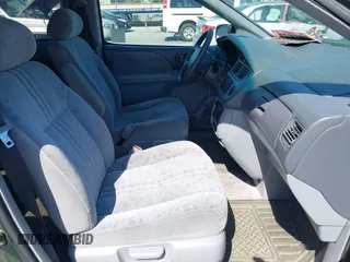 2002 Toyota Sienna LE with VIN 4T3ZF13C62U475863, listed as a IAAI auction lot 42215728 with 151,489 mi miles and . Bid and sale history available at DreamBid. Image 5.