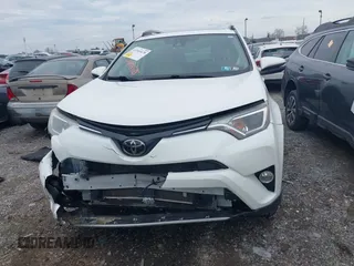 2018 Toyota RAV4 XLE with VIN JTMRFREV8JJ225065, listed as a IAAI auction lot 41940678 with 145,074 mi miles. Bid and sale history available at carsss.com. Image 12.