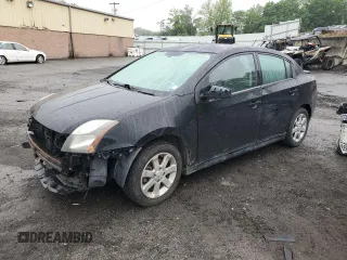 2012 Nissan Sentra SR z VIN 3N1AB6AP7CL637717, wystawiony jako Copart lot #58307055 z przebiegiem 159 833 mil mil oraz Nie do naprawy • Non repairable. Historia ofert i sprzedaży dostępna na DreamBid. Obrazek 1.