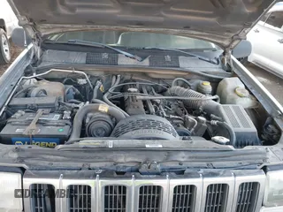 1998 Jeep Grand Cherokee Laredo with VIN 1J4GZ58S9WC136684, listed as a IAAI auction lot 41444103 with 1 mi miles. Bid and sale history available at carsss.com. Image 10.