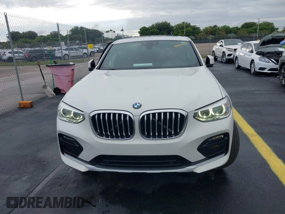 2020 BMW X4 xDrive30i z VIN 5UX2V1C02LLE68148, wystawiony jako IAAI lot #42253362 z przebiegiem 80 865 mil mil oraz . Historia ofert i sprzedaży dostępna na DreamBid. Obrazek 12.