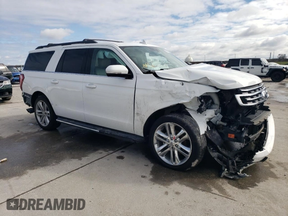 2020 Ford Expedition Max XLT with VIN 1FMJK1HT6LEA65263, listed as a Copart auction lot 87972395 with 94,412 mi miles and Salvage Title. Bid and sale history available at DreamBid. Image 4.