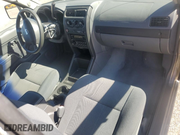 2003 Nissan Frontier XE with VIN 1N6DD26T03C445597, listed as a Copart auction lot 46808225 with 63,384 mi miles and Salvage title. Bid and sale history available at DreamBid. Image 8.