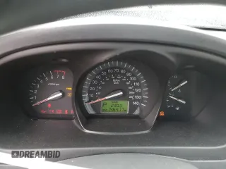2009 Kia Spectra EX with VIN KNAFE222495648220, listed as a Copart auction lot 52886915 with 146,417 mi miles and Salvage title. Bid and sale history available at DreamBid. Image 9.