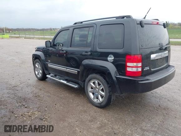 2012 Jeep Liberty Sport with VIN 1C4PJMAKXCW192564, listed as a IAAI auction lot 41948090 with 156,027 mi miles. Bid and sale history available at carsss.com. Image 3.