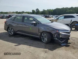 2018 Honda Clarity Plug-In Hybrid Touring with VIN JHMZC5F3XJC015973, listed as a Copart auction lot 56385394 with 127,660 mi miles and Salvage Title. Bid and sale history available at carsss.com. Image 4.