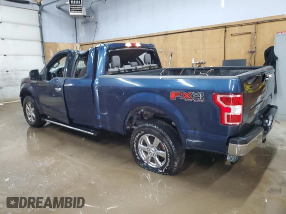 2018 Ford F-150 XL with VIN 1FTFX1E57JFE75983, listed as a Copart auction lot 52619685 with 184,124 mi miles and Clean title. Bid and sale history available at DreamBid. Image 2.