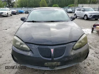 2005 Pontiac Grand Prix z VIN 2G2WP522851195623, wystawiony jako Copart lot #52716385 z przebiegiem 266 660 mil mil oraz Czysty tytuł • Clean title. Historia ofert i sprzedaży dostępna na DreamBid. Obrazek 5.