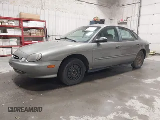 1999 Ford Taurus LX Standard with VIN 1FAFP52U0XG308165, listed as a IAAI auction lot 42509140 with 238,920 mi miles and . Bid and sale history available at DreamBid. Image 2.