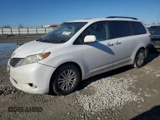 2012 Toyota Sienna XLE AAS with VIN 5TDYK3DC2CS243832, listed as a Copart auction lot 46677115 with 253,252 mi miles and Salvage Title. Bid and sale history available at DreamBid. Image 1.