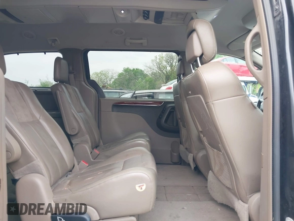 2014 Chrysler Town & Country Limited with VIN 2C4RC1GG3ER188114, listed as a IAAI auction lot 42082618 with 193,562 mi miles and . Bid and sale history available at DreamBid. Image 8.