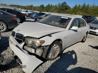 2004 BMW 7 Series 745i with VIN WBAGL63484DP68795, listed as a Copart auction lot 77201084 with 134,044 mi miles and Salvage Title. Bid and sale history available at DreamBid. Image 1.