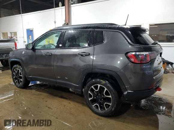 2020 Jeep Compass Trailhawk with VIN 3C4NJDDB3LT112028, listed as a Copart auction lot 45790115 with 86,703 mi miles and Salvage Title. Bid and sale history available at carsss.com. Image 2.
