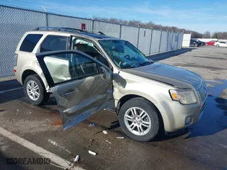 2011 Mercury Mariner Premier with VIN 4M2CN9HG4BKJ05985, listed as a IAAI auction lot 41132168 with 84,031 mi miles. Bid and sale history available at carsss.com. Image 1.