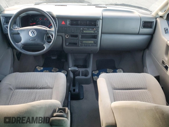 2003 Volkswagen EuroVan MV с VIN WV2MB47053H002505, выставлен на аукционе Copart как лот 83840884 с пробегом 250 786 миль миль и Чистый • Clean title. История ставок и продаж доступна на DreamBid. Изображение 8.