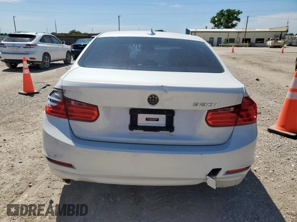 2015 BMW 3 Series 320i with VIN WBA3B1C5XFP831703, listed as a Copart auction lot 57561155 with 135,034 mi miles and Salvage title. Bid and sale history available at DreamBid. Image 6.