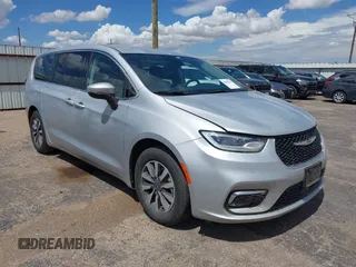 2023 Chrysler Pacifica Hybrid Touring L with VIN 2C4RC1L70PR626077, listed as a IAAI auction lot 42606014 with 49,617 mi miles and . Bid and sale history available at DreamBid. Image 1.
