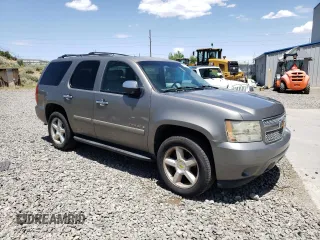 2007 Chevrolet Tahoe LT with VIN 1GNFK13027R350264, listed as a Copart auction lot 61235235 with 240,721 mi miles and Salvage title. Bid and sale history available at DreamBid. Image 4.