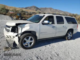 2011 Chevrolet Suburban LTZ with VIN 1GNSKKE33BR399896, listed as a Copart auction lot 72804084 with 169,035 mi miles and Salvage Title. Bid and sale history available at carsss.com. Image 1.