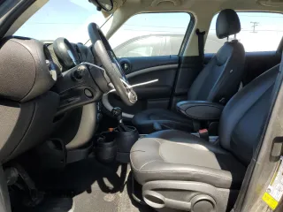 2014 MINI Countryman with VIN WMWZB3C54EWR39731, listed as a Copart auction lot 63635215 with 85,751 mi miles and Salvage title. Bid and sale history available at DreamBid. Image 7.