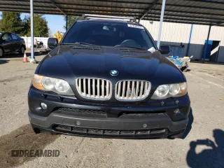 2005 BMW X5 4.8is with VIN 5UXFA93515LE83489, listed as a Copart auction lot 87840265 with 131,786 mi miles and Salvage Title. Bid and sale history available at carsss.com. Image 5.