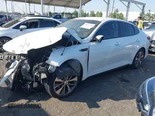 2016 Kia Optima SX Turbo with VIN 5XXGW4L2XGG043934, listed as a IAAI auction lot 40451940 with 86,386 mi miles and . Bid and sale history available at carsss.com. Image 17.