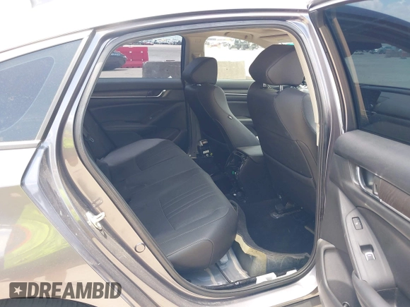 2019 Honda Accord Touring with VIN 1HGCV2F93KA013002, listed as a IAAI auction lot 42519920 with 76,841 mi miles and . Bid and sale history available at DreamBid. Image 8.