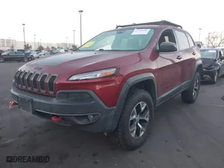 2016 Jeep Cherokee Trailhawk with VIN 1C4PJMBS8GW285376, listed as a IAAI auction lot 41798995 with 84,297 mi miles. Bid and sale history available at carsss.com. Image 18.