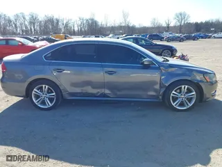 2013 Volkswagen Passat SE w/Sunroof with VIN 1VWBM7A30DC125919, listed as a IAAI auction lot 41759051 with 112,952 mi miles. Bid and sale history available at carsss.com. Image 13.