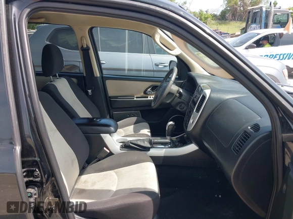 2006 Mercury Mariner Convenience with VIN 4M2YU56Z66KJ04591, listed as a IAAI auction lot 42469116 with 174,952 mi miles and . Bid and sale history available at DreamBid. Image 5.