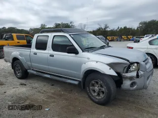 2003 Nissan Frontier SE z VIN 1N6ED29X33C413665, wystawiony jako Copart lot #43689245 z przebiegiem 188 345 mil mil oraz Szkoda całkowita • Salvage title. Historia ofert i sprzedaży dostępna na DreamBid. Obrazek 4.
