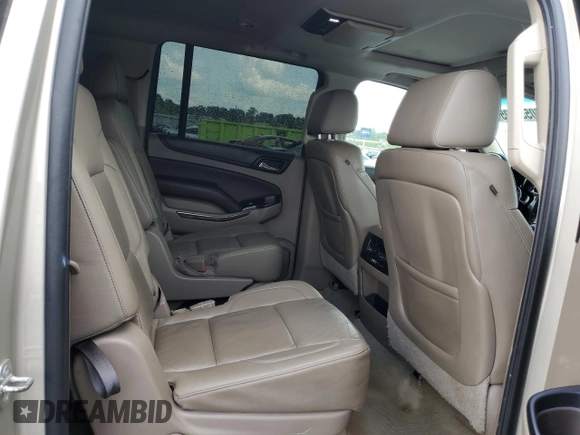 2015 Chevrolet Suburban LT z VIN 1GNSCJKC3FR652426, wystawiony jako Copart lot #60554405 z przebiegiem 200 570 mil mil oraz Szkoda całkowita • Salvage title. Historia ofert i sprzedaży dostępna na DreamBid. Obrazek 11.