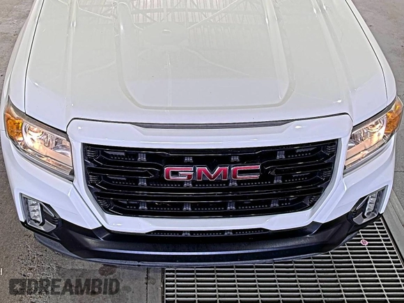 2021 GMC Canyon 2WD Elevation z VIN 1GTG5CEN5M1140499, wystawiony jako IAAI lot #42556124 z przebiegiem 41 450 mil mil oraz . Historia ofert i sprzedaży dostępna na DreamBid. Obrazek 20.