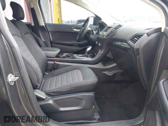 2017 Ford Edge SE z VIN 2FMPK3G97HBC65342, wystawiony jako IAAI lot #42610031 z przebiegiem 103 521 mil mil oraz . Historia ofert i sprzedaży dostępna na DreamBid. Obrazek 5.