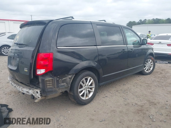 2018 Dodge Grand Caravan SXT with VIN 2C4RDGCGXJR283091, listed as a IAAI auction lot 41966553 with 102,309 mi miles and . Bid and sale history available at DreamBid. Image 4.