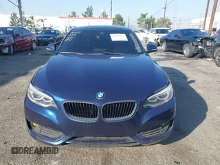 2015 BMW 2 Series 228i xDrive with VIN WBA1F7C5XFV367287, listed as a IAAI auction lot 40802463 with 113,427 mi miles and . Bid and sale history available at carsss.com. Image 12.