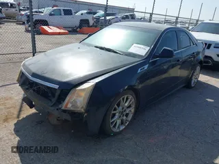 2011 Cadillac CTS Premium with VIN 1G6DS5ED9B0151820, listed as a IAAI auction lot 41909346 with 142,007 mi miles. Bid and sale history available at carsss.com. Image 2.