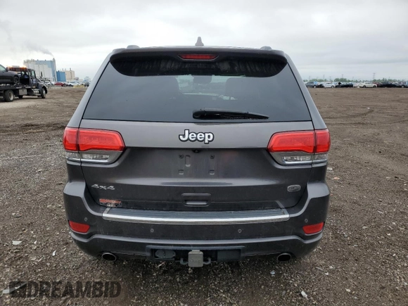2017 Jeep Grand Cherokee Overland with VIN 1C4RJFCG8HC607872, listed as a Copart auction lot 57493195 with 164,478 mi miles and Salvage title. Bid and sale history available at DreamBid. Image 6.