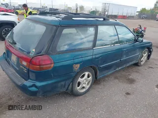 1999 Subaru Legacy L z VIN 4S3BK4355X6305664, wystawiony jako IAAI lot #42077758 z przebiegiem 70 585 mil mil oraz . Historia ofert i sprzedaży dostępna na DreamBid. Obrazek 4.