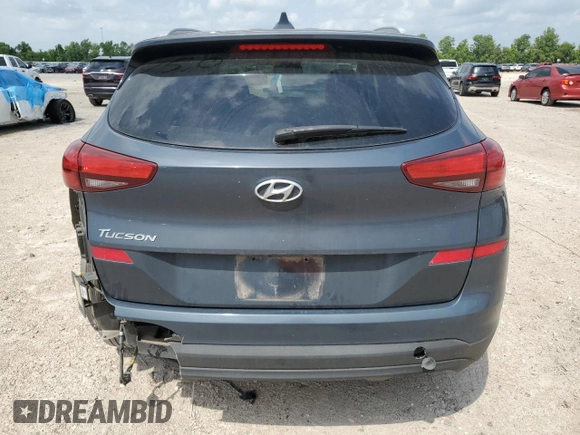 2019 Hyundai Tucson Value z VIN KM8J33A40KU914285, wystawiony jako Copart lot #54839375 z przebiegiem 81 214 mil mil oraz Szkoda całkowita • Salvage title. Historia ofert i sprzedaży dostępna na DreamBid. Obrazek 6.