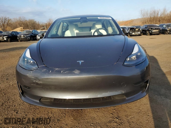 2023 Tesla Model 3 Long Range with VIN 5YJ3E1EBXPF660900, listed as a Copart auction lot 48923265 with 9,954 mi miles and Salvage Title. Bid and sale history available at DreamBid. Image 5.
