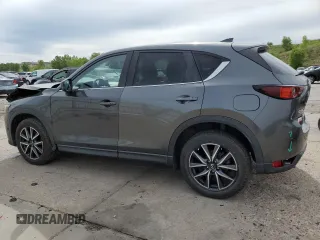 2018 Mazda CX-5 Touring z VIN JM3KFBCM2J0379190, wystawiony jako Copart lot #59233075 z przebiegiem 51 985 mil mil oraz Szkoda całkowita • Salvage title. Historia ofert i sprzedaży dostępna na DreamBid. Obrazek 2.