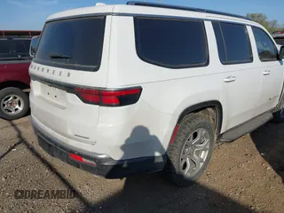 2022 Jeep Wagoneer Series II with VIN 1C4SJUBT1NS130210, listed as a IAAI auction lot 41826902 with 80,369 mi miles and . Bid and sale history available at DreamBid. Image 4.