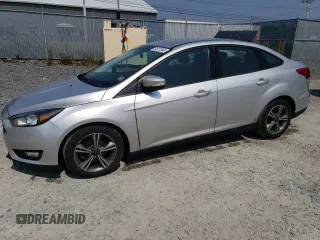 2016 Ford Focus SE with VIN 1FADP3FE8GL353103, listed as a Copart auction lot 64972865 with 131,403 mi miles and Clean title. Bid and sale history available at DreamBid. Image 1.