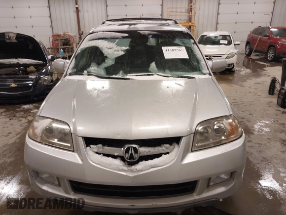2004 Acura MDX Touring Pkg w/Navigation with VIN 2HNYD18874H506394, listed as a IAAI auction lot 41589065 with 211,253 mi miles. Bid and sale history available at carsss.com. Image 6.