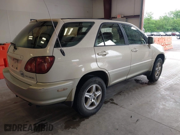 1999 Lexus RX 300 z VIN JT6HF10UXX0013043, wystawiony jako IAAI lot #42355691 z przebiegiem 287 705 mil mil oraz . Historia ofert i sprzedaży dostępna na DreamBid. Obrazek 4.