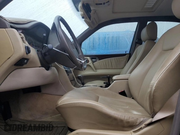 1997 Mercedes-Benz E-Class with VIN WDBJF55FXVJ027722, listed as a Copart auction lot 44835585 with 0 mi miles and Salvage Title. Bid and sale history available at carsss.com. Image 7.